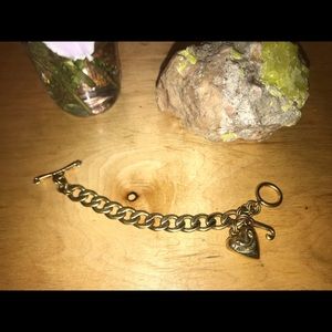 Juicy couture charm bracelet mildly worn.